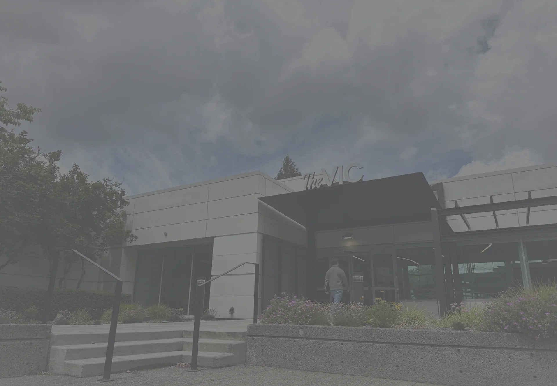 Patrick Santiago walking to the Vancouver Innovation Center entrance